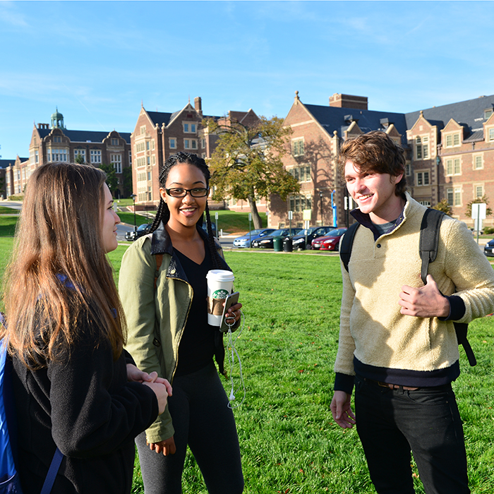 three students on campus