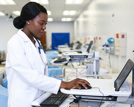 Nursing student working on computer