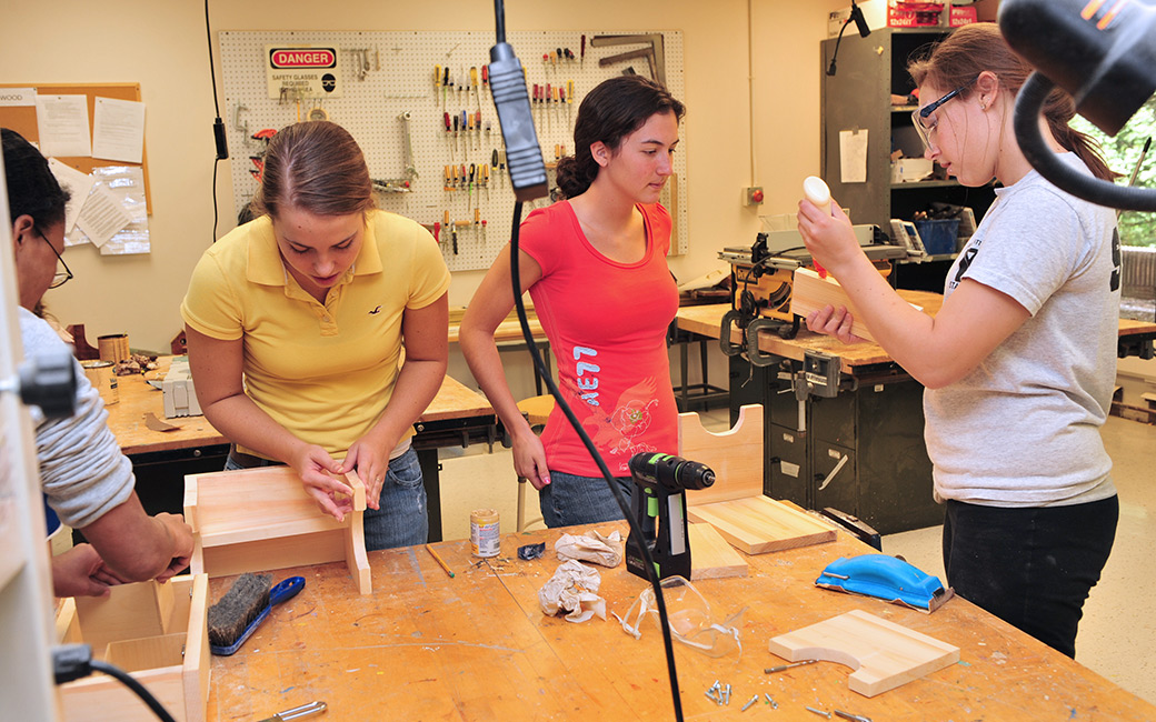 Occupational Therapy students learning and working in a classroom "work analysis" laboratory