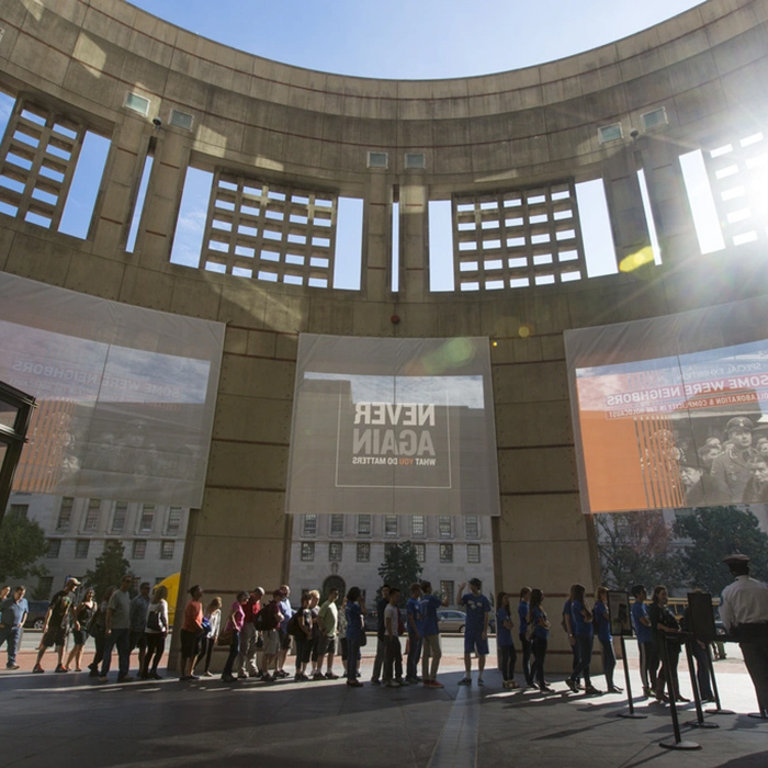 A group of people waiting in line at the U.S. Holocaust Memorial Museum