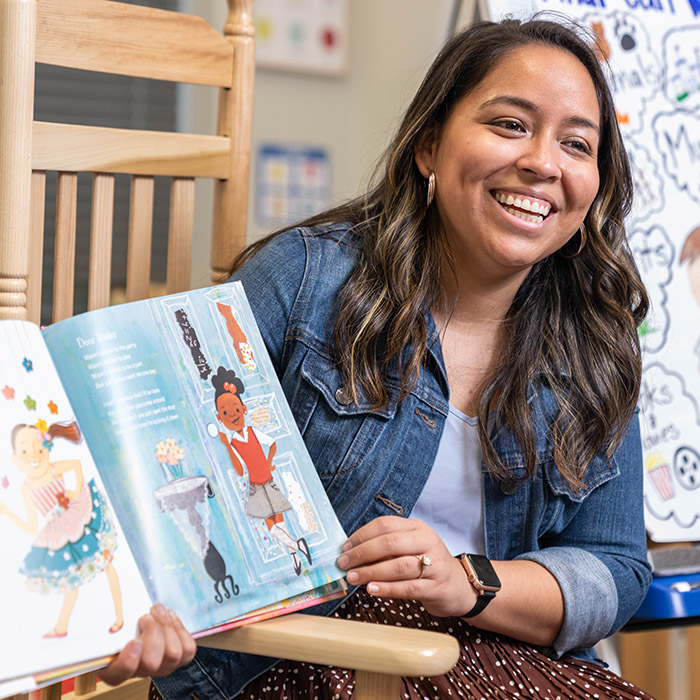 Teresa Valverde reads to her students