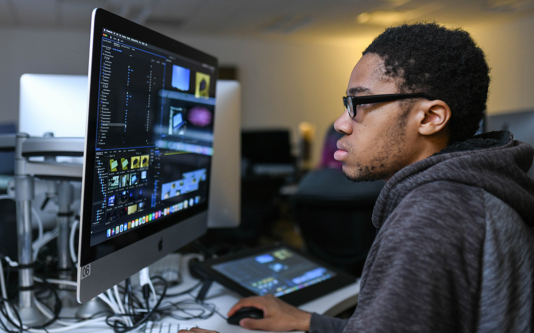 art student in computer studio