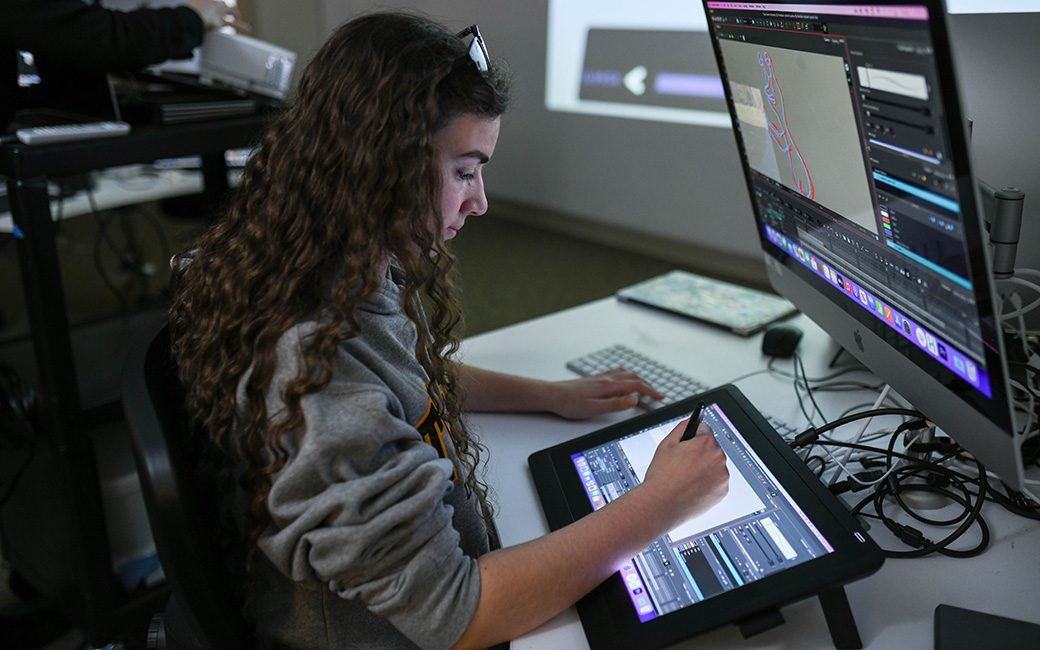 art student in computer studio 