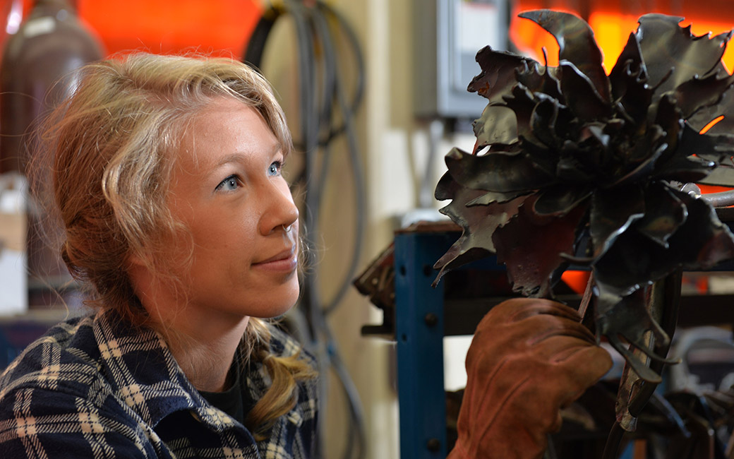 student with sculpture