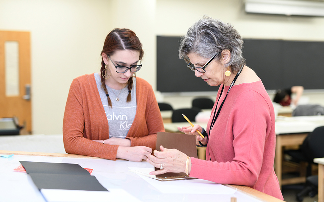 one on one student critique with faculty member