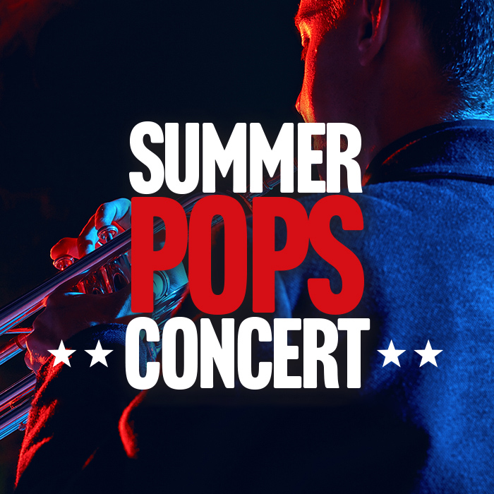 A patriotic trumpet player faces away from the camera in red and blue lighting