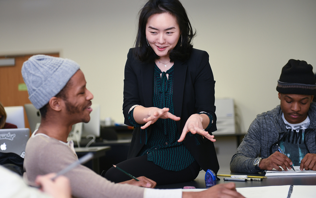 Illustration Professor Seo Kim working with students