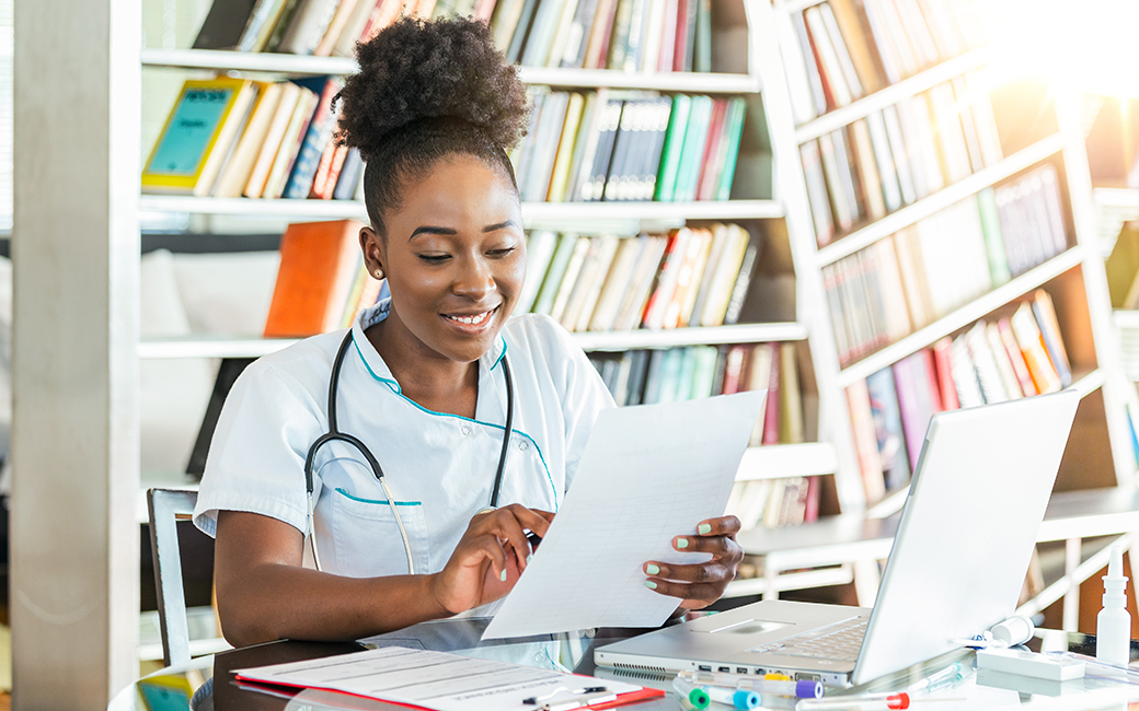 A woman transcribing medical records