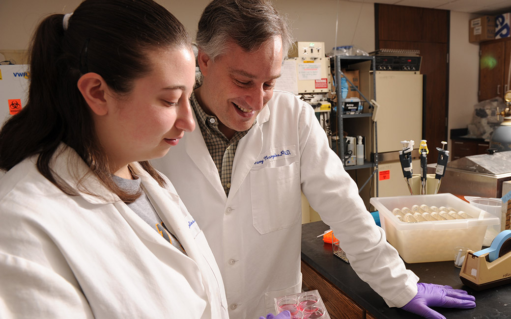 professor and student in laboratory