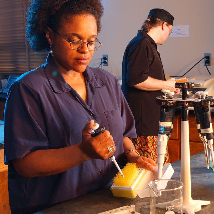 two students in biology lab