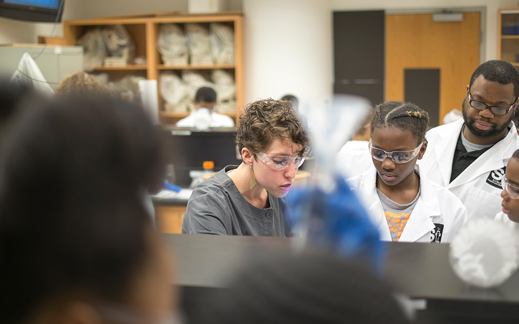 Teacher with students in lab