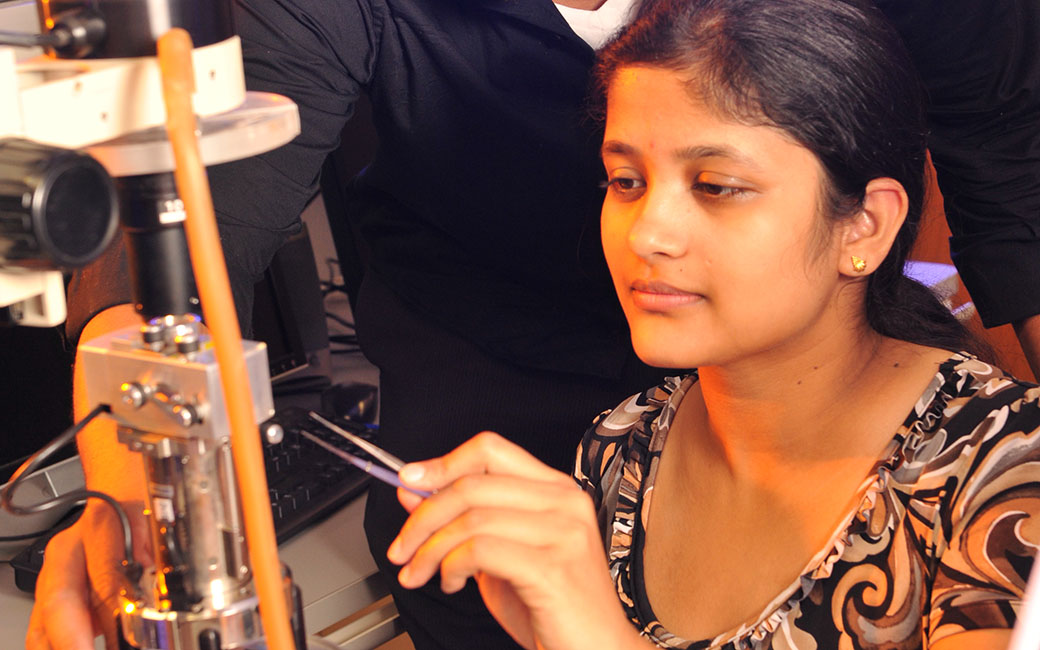 student engaged in lab work