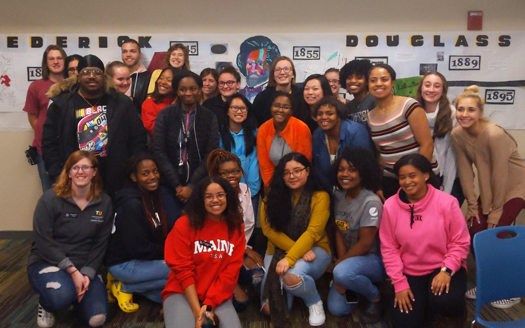 Large group of students smiling at camera