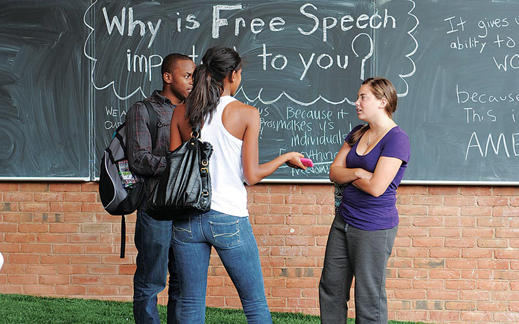 students talking in front of freedom square students talking in front of freedom square