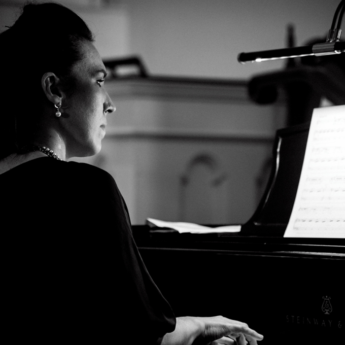 Elizabeth Borowsky playing the piano