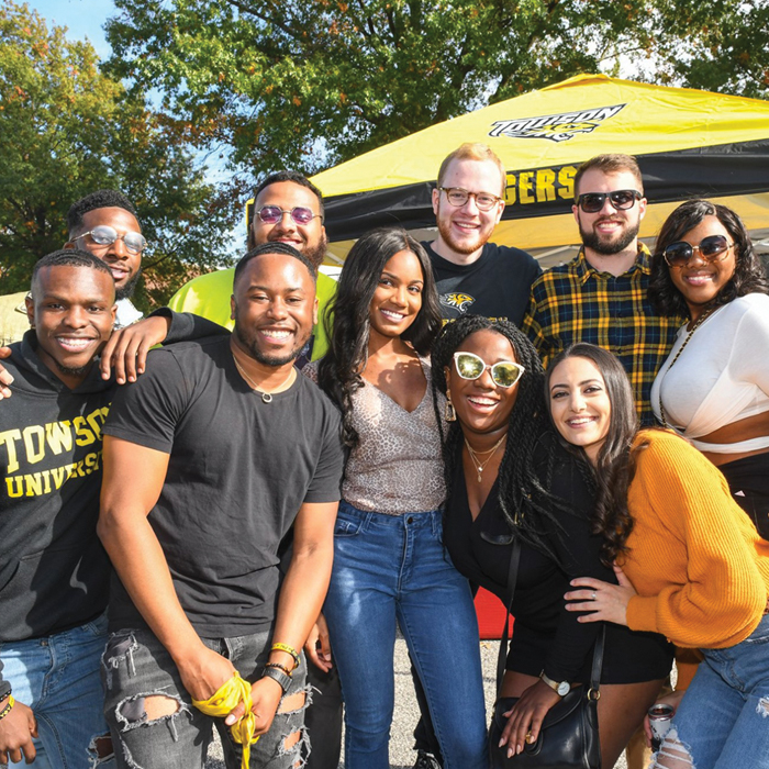 Alumni having fun tailgating before football