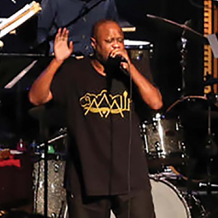 Shodekah performing on stage