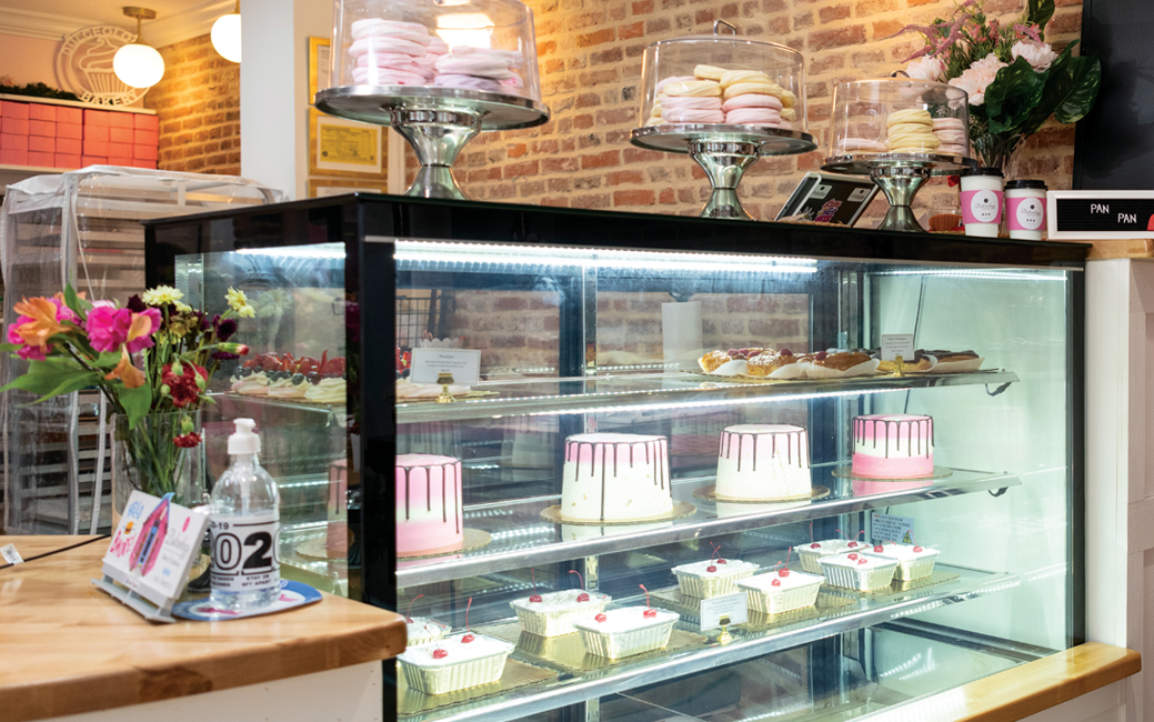 Bakery display case with cakes inside