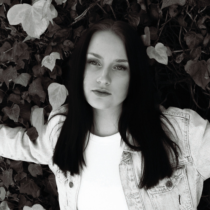 black and white image of Ashley Kutcher '20