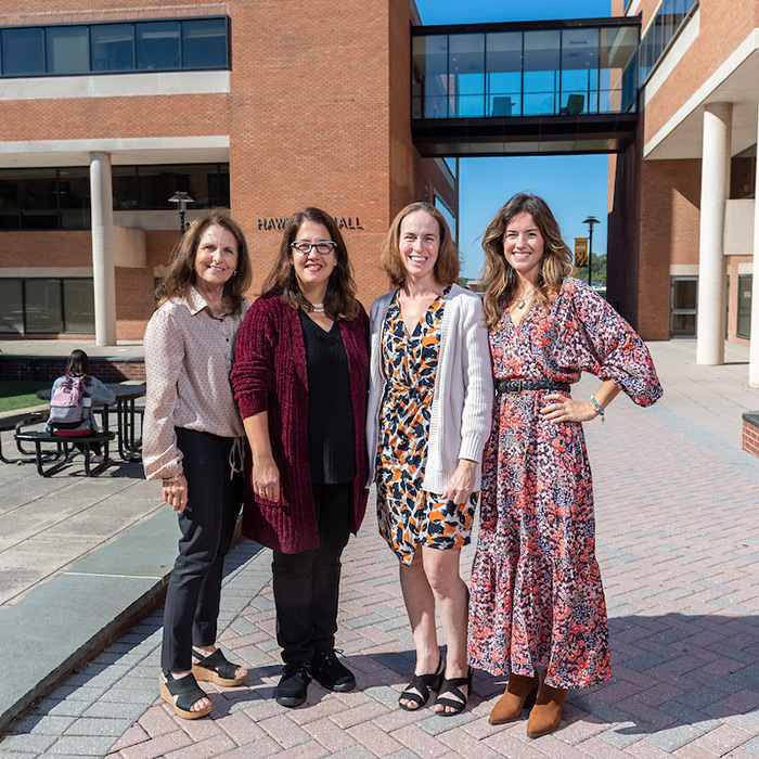 Education professors and dean with project director