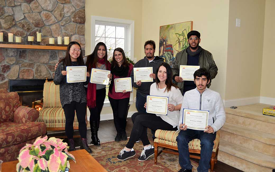 ELC students posing with certificates