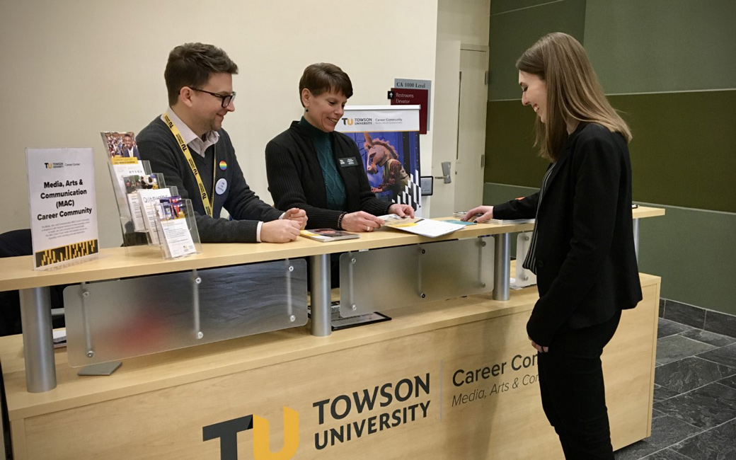 Career Center staff members meet with student