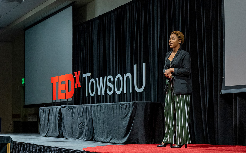 A presenter speaks at TEDxTowsonU.