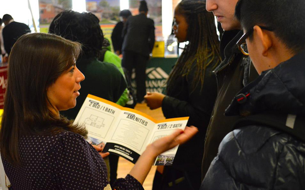 Parents ask a Student Life representative about housing options