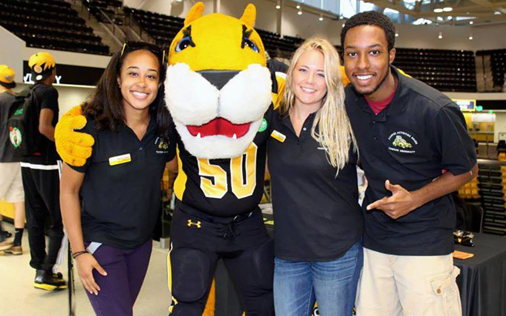 Students posing with Doc