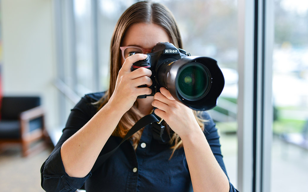 photographer with camera
